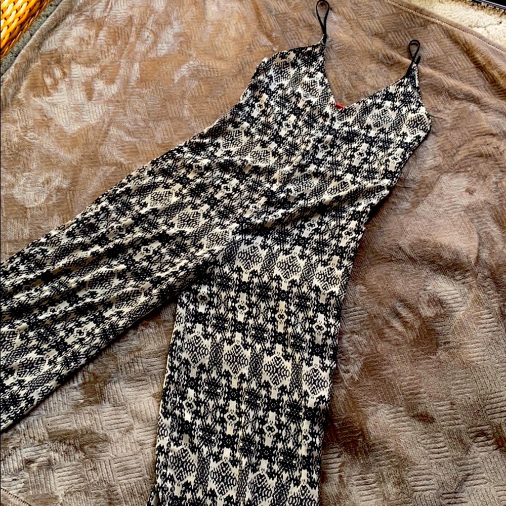 Black and white flowy silky romper with low back